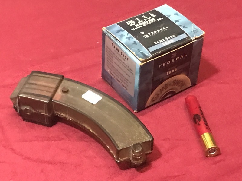 lot 51 image: Ruger 1022 Magazine & Partial Box Of .410 Shotshells