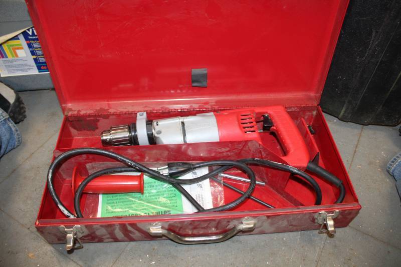 lot 603 image: Milwaukee Tools 12in. Hammer Drill w Case