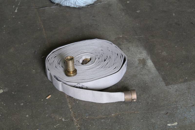 lot 343 image: Fire Hose w Nozzle
