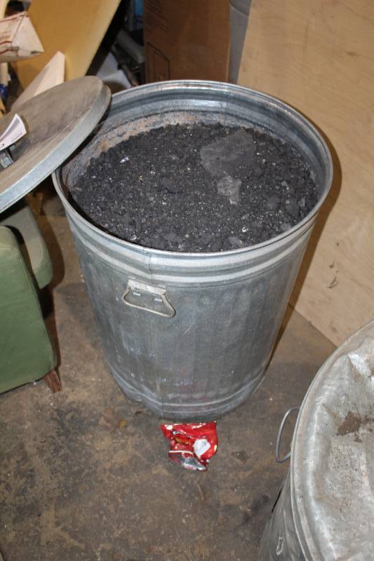 lot 569 image: Garbage Can of Charcoal
