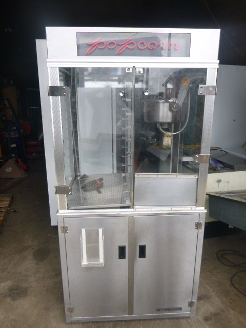 lot 5 image: Gold Medal Popcorn Machine and Display Warmer and Cabinet