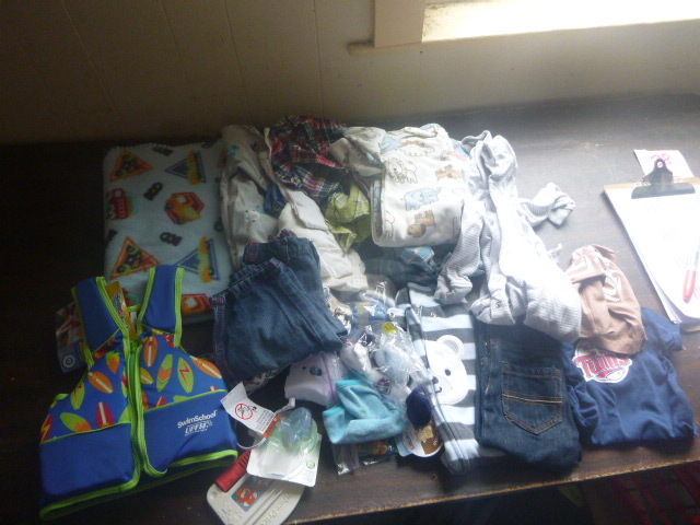 lot 32 image: Tote Full of Baby Clothes