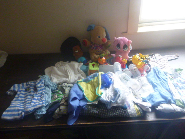 lot 33 image: Tote Full of Baby Clothes