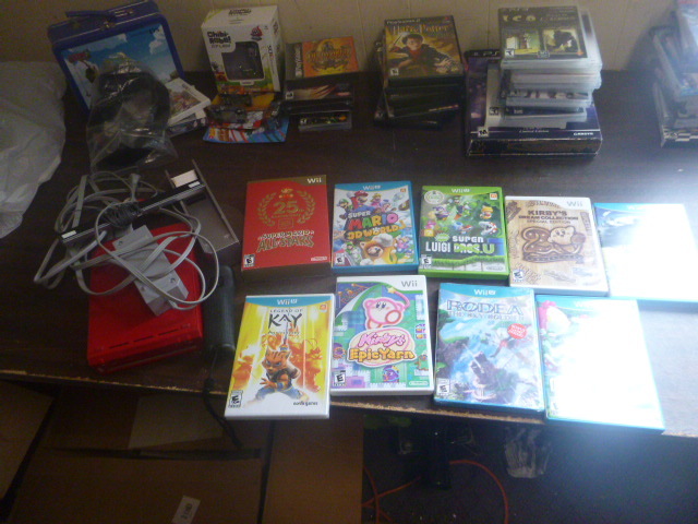 lot 40 image: Wii with Control and Games