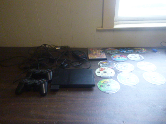 lot 48 image: PlayStation 2 with 2 Controllers and Games