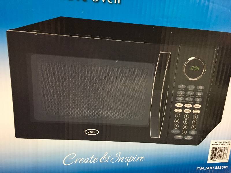 Oster 1.1CUFT Countertop Microwave Oven, Retail $69.99