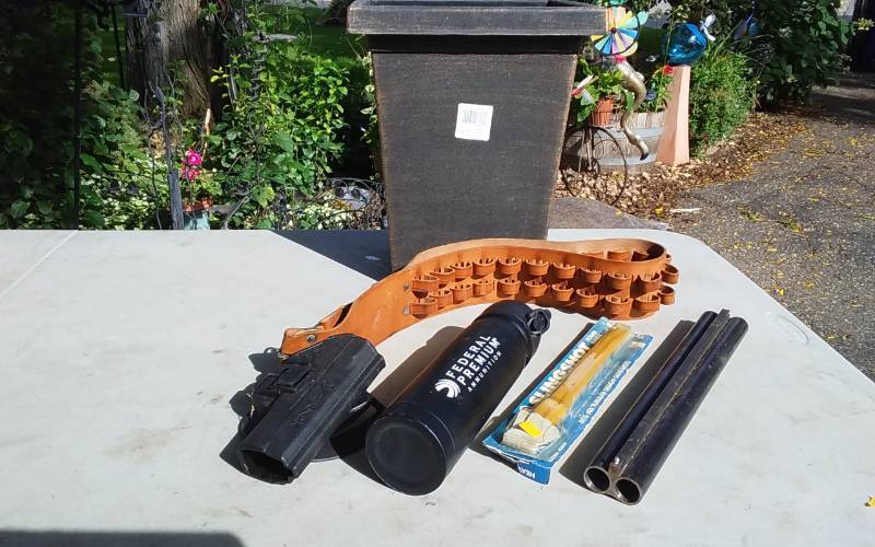 lot 63 image: Ammo Belt, Holster, Sling Shot Band, Barrel Piece
