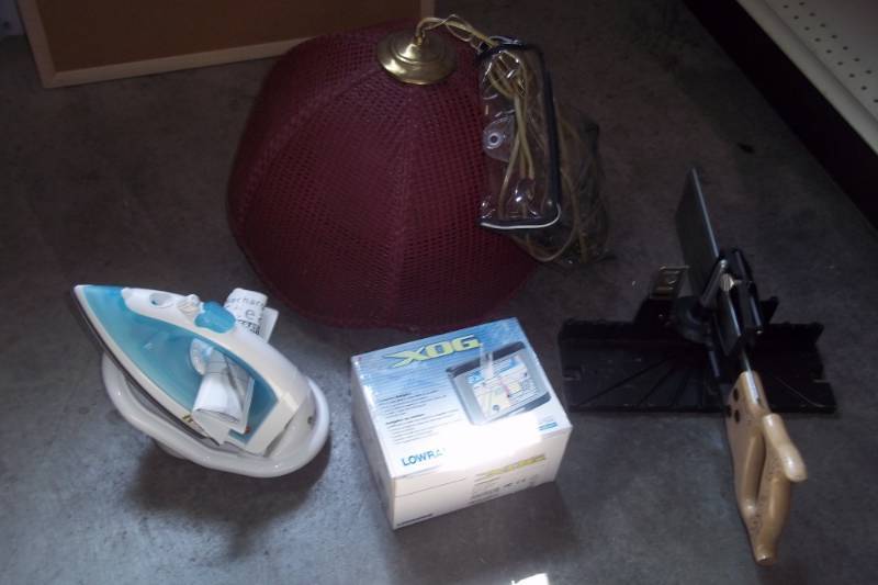 lot 23 image: Iron, hanging light, Lowrance GPS and Miter Saw