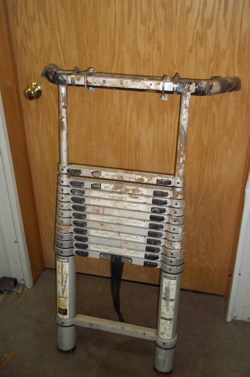 lot 24 image: 12.5 Foot Telescoping Extension Ladder