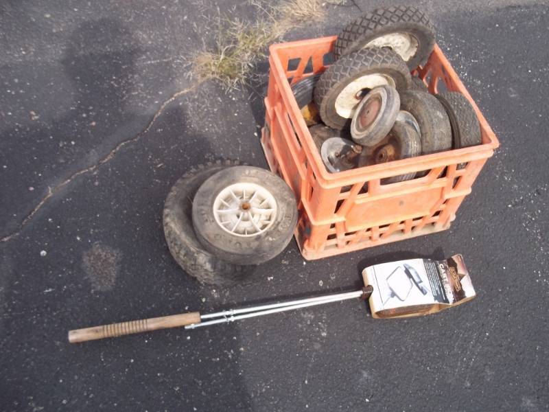 lot 138 image: Lawn Mower Wheels and Cast Iron Sandwich maker