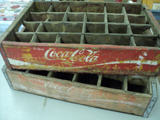 2 Coca-Cola boxes...