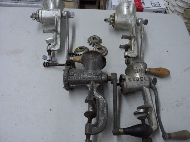 4 cast iron grinders...