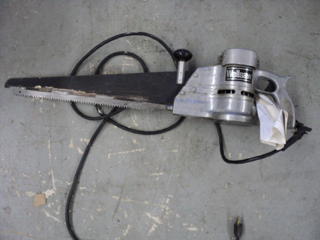 tools, gunny sacks, and cooler with...