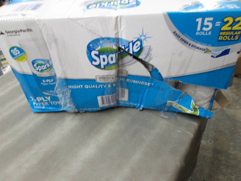 lot 128 image: Damaged Case of Sparkle 2 Ply paper...