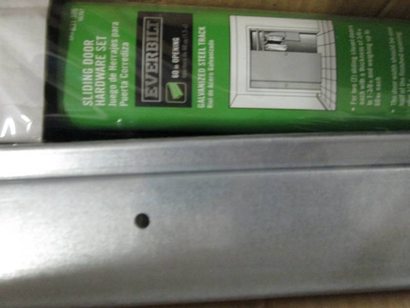 lot 192 image: Lot of 2 Everbilt 60 in. Sliding Do...