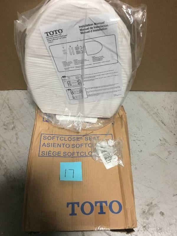 lot 17 image: Toto SoftClose Elongated Closed Front Toilet Seat in Cotton White in good Conditions