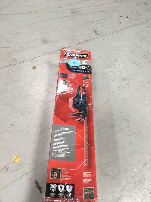 lot 58 image: SNAPPER 60-Volt Max Lithium-Ion Cordless Hedge Trimmer in working conditions