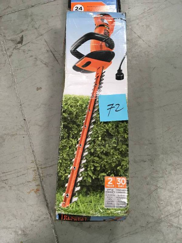 lot 72 image: Black and Decker Corded hedge Trimmer in like new condition