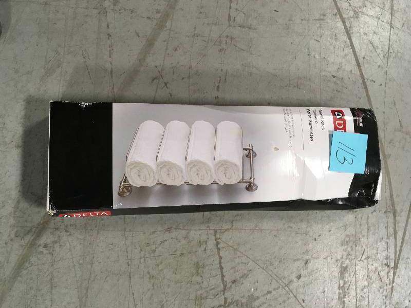 lot 113 image: Delta 5-Bar Wall-Mounted Towel Rack in SpotShield Brushed Nickel in Good Condition