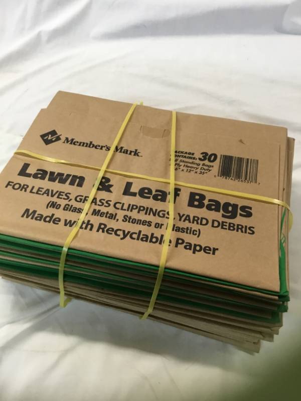 lot 96 image: 2 packages of Members Mark Paper Lawn and leaf bags 30 ct (60 total) 2 ply heavy duty self standing.