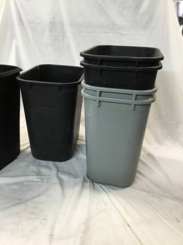 lot 105 image: 6 commercial garbage cans 3 Rubbermaid, 2 Continental and a starlight.