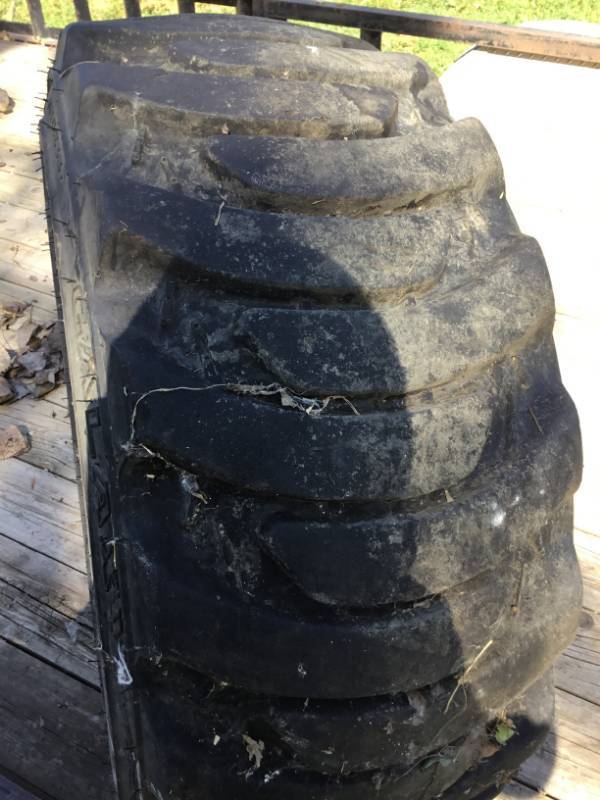lot 116 image: Bob Cat Tire - Galaxy - Still has Knobs - Very little use