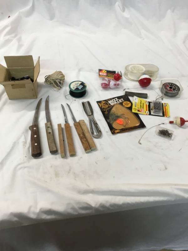 lot 147 image: fishing gear and knives reel