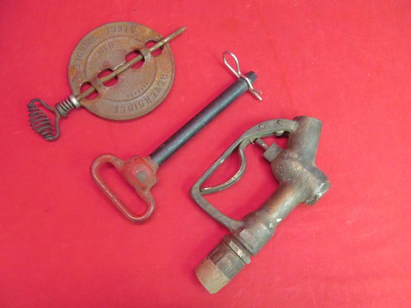 lot 3 image: hitch pin, damper, pump handle
