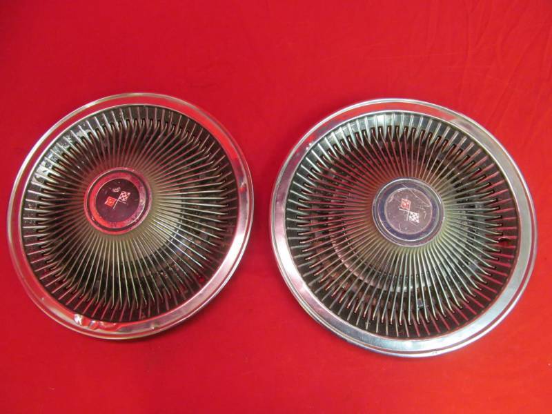 lot 41 image: Vintage hub caps