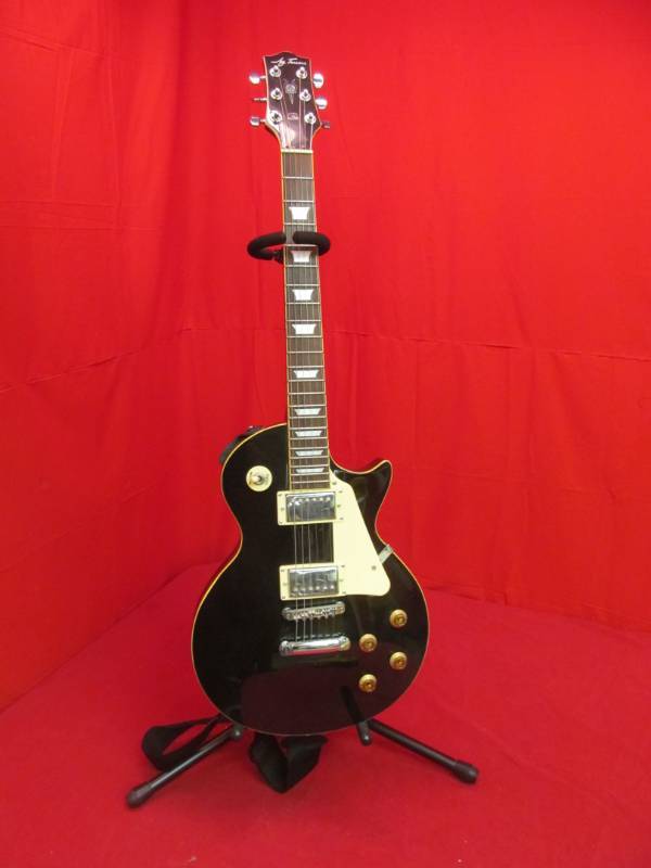 lot 115 image: Jay Turser electric guitar and stand