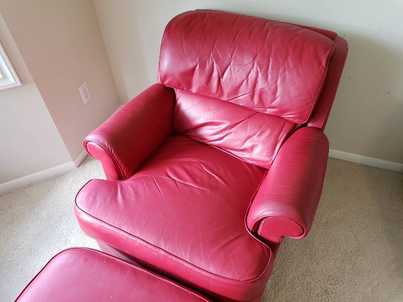 lot 13 image: High-end Leathercraft Red Leather Club Chair and Ottoman