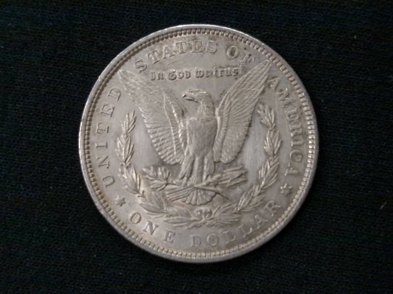 lot 5 image: 1879 Morgan Silver Dollar...
