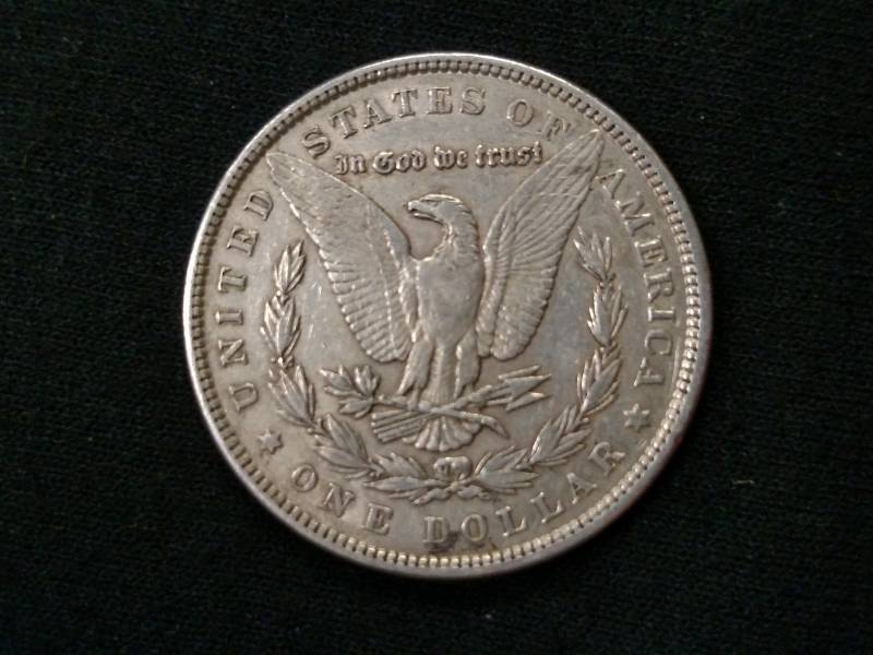 lot 8 image: 1884 Morgan Silver Dollar...