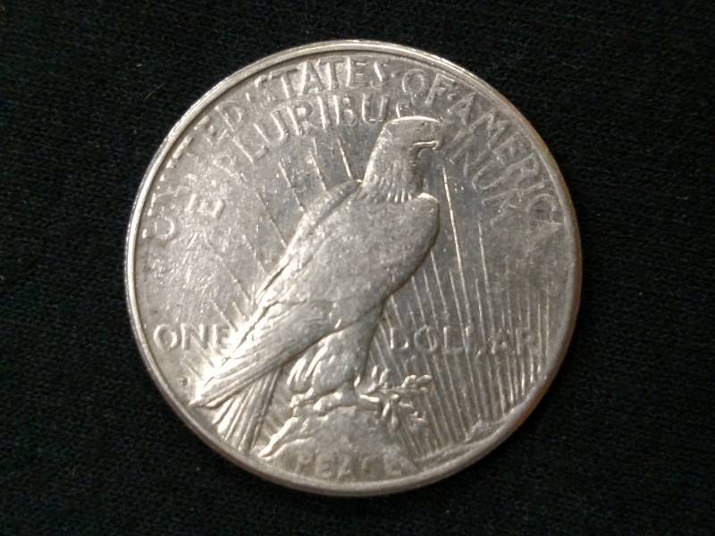 lot 20 image: 1922 S Peace Silver Dollar...