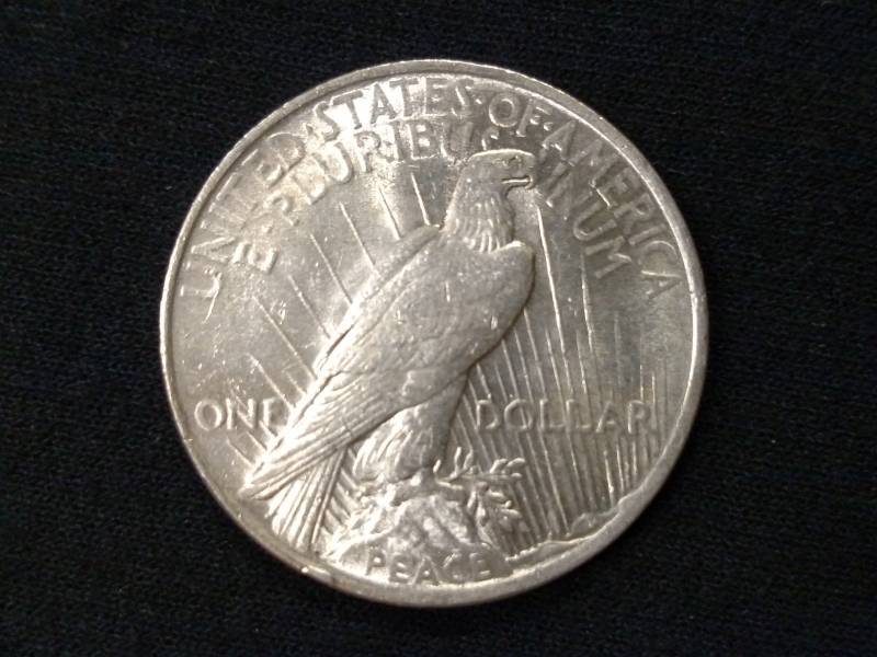 lot 21 image: 1923 Peace Silver Dollar...