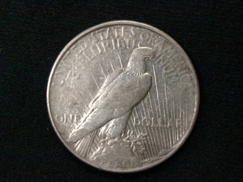 lot 22 image: 1923 D Peace Silver Dollar...