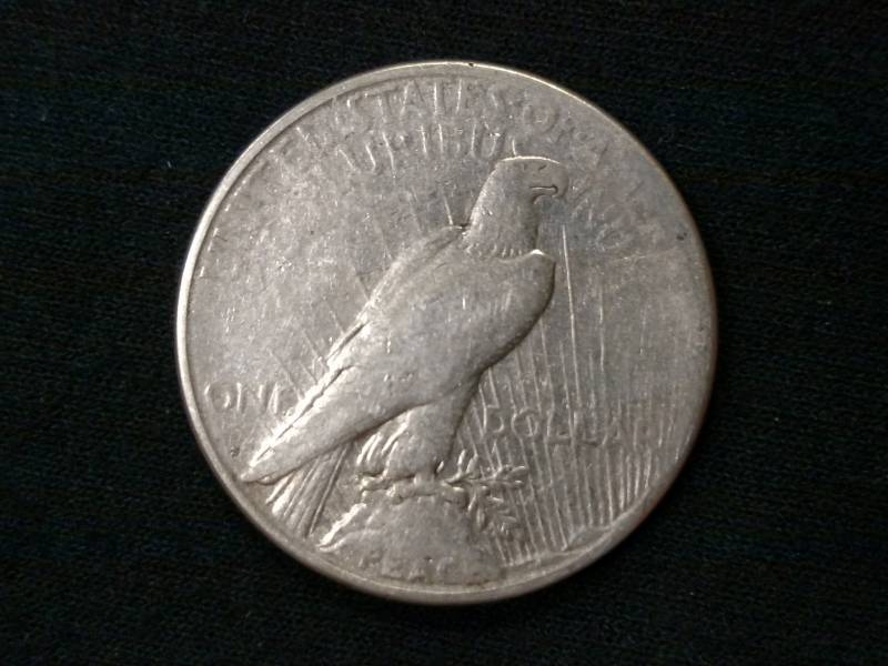 lot 23 image: 1923 S Peace Silver Dollar...