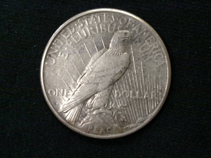 lot 25 image: 1925 S Peace Silver Dollar...