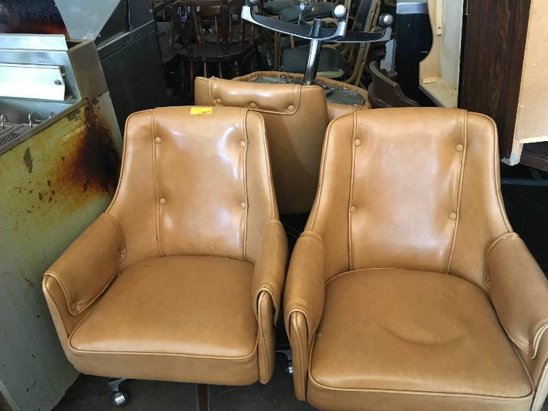 lot 43 image: Four Swivel Dining Chairs