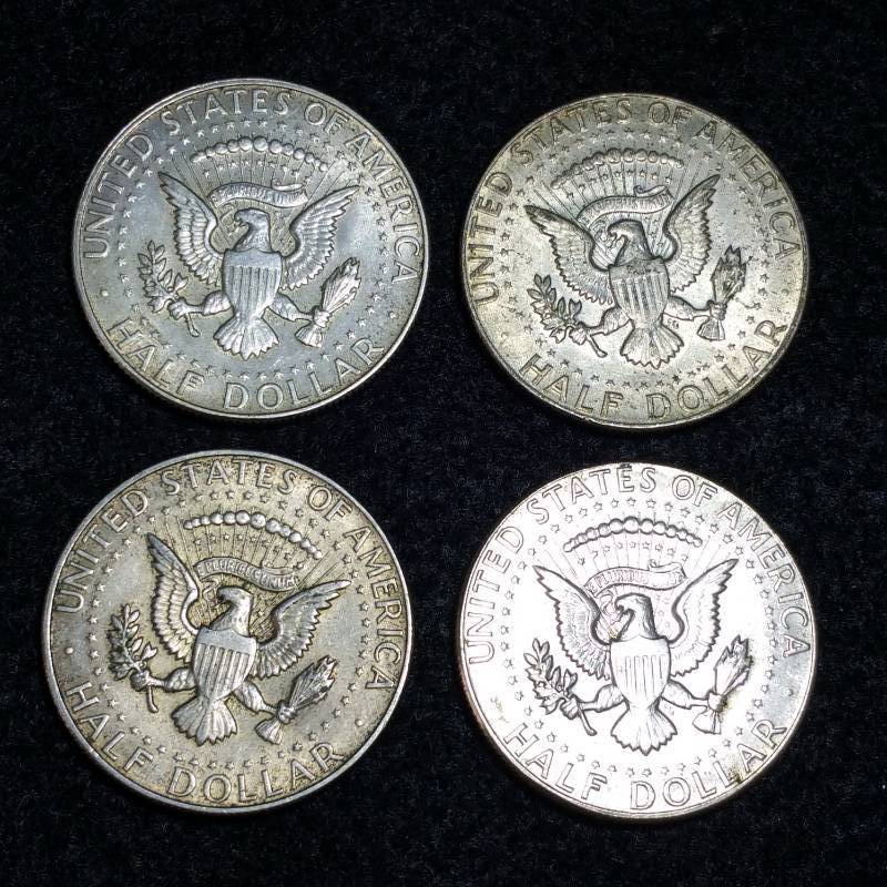 lot 35 image: (4) 1965 - 1969 Kenney Half 40% Silver Dollars