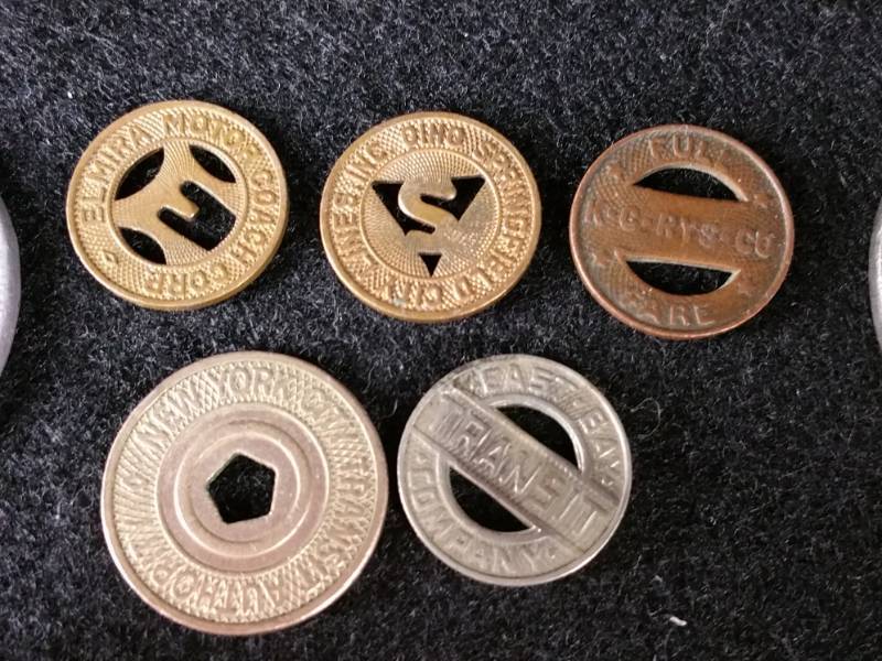 lot 49 image: Fare Tokens, Tax Tokens, Casino Tokens, Pins, Etc.