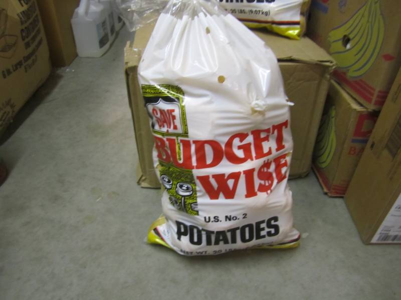 lot 28 image: 20 Pound Bag of Potatoes  C-1...