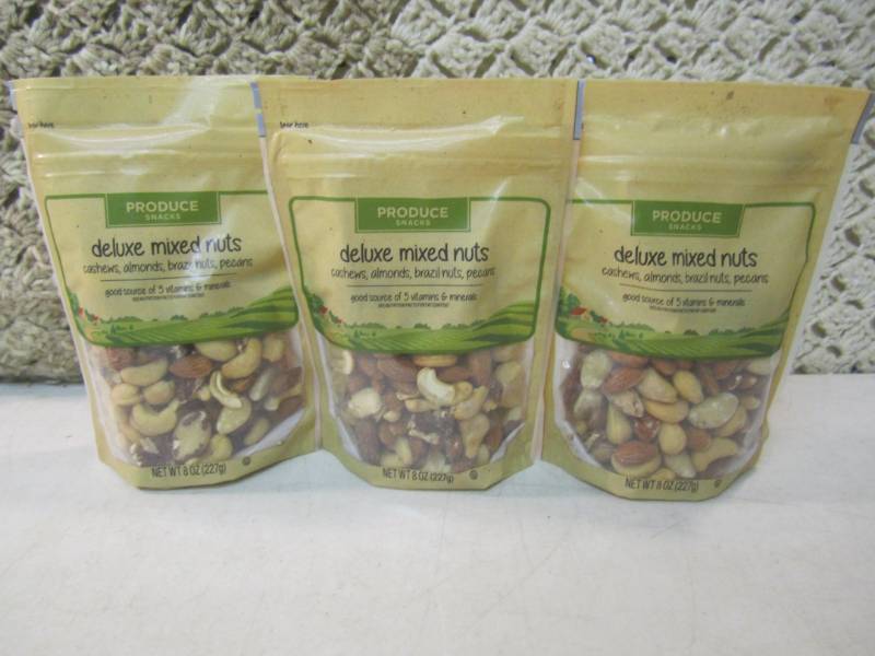 lot 70 image: 3 Bags of Deluxe Mixed Nuts Best by...