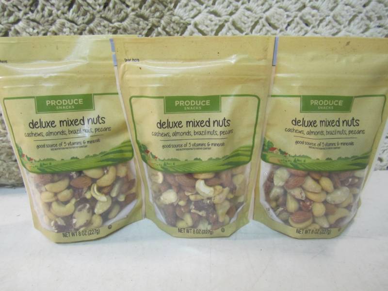 lot 71 image: 3 Bags of Deluxe Mixed Nuts Best by...