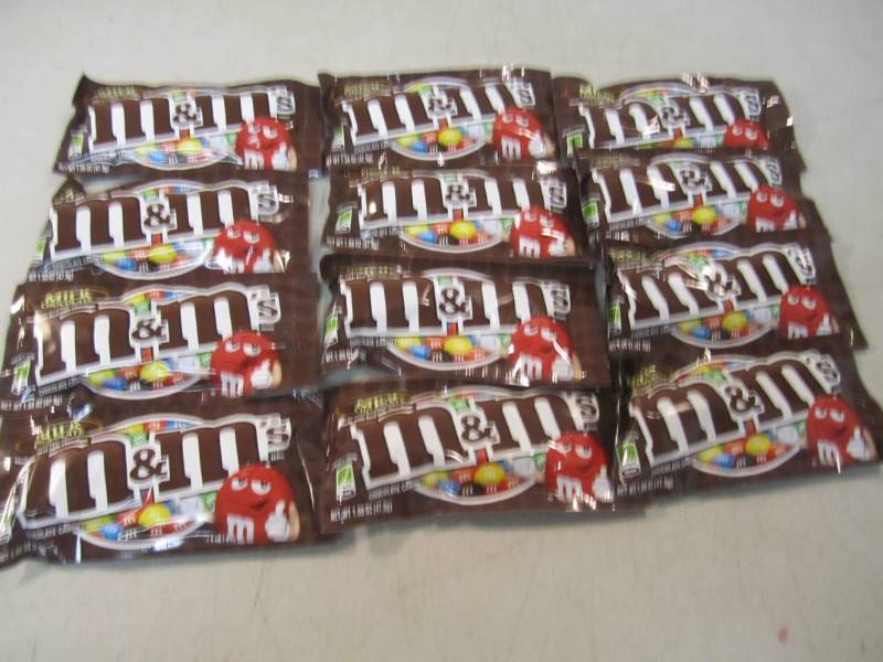 lot 73 image: 12 Bags of M&Ms Best by Nov 2018  ...