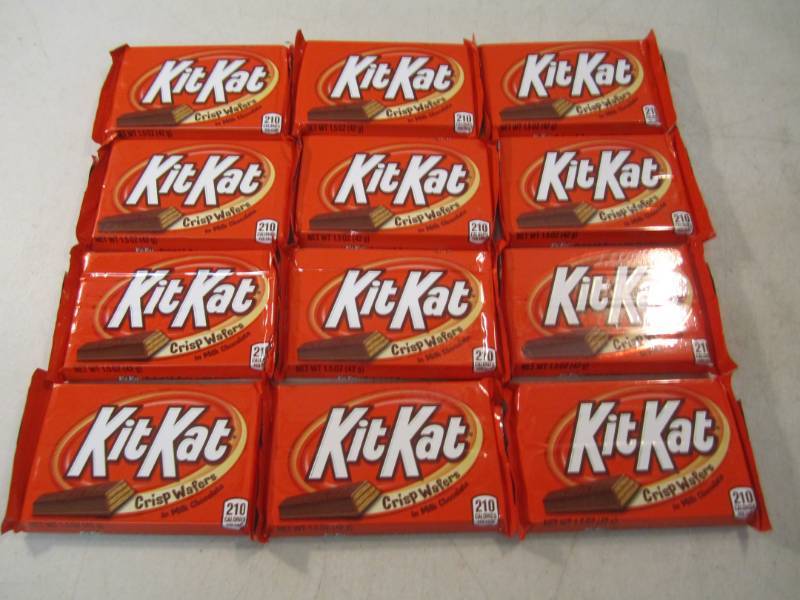 lot 76 image: 12 Kit Kat Candy Bars Best by Aug 2...