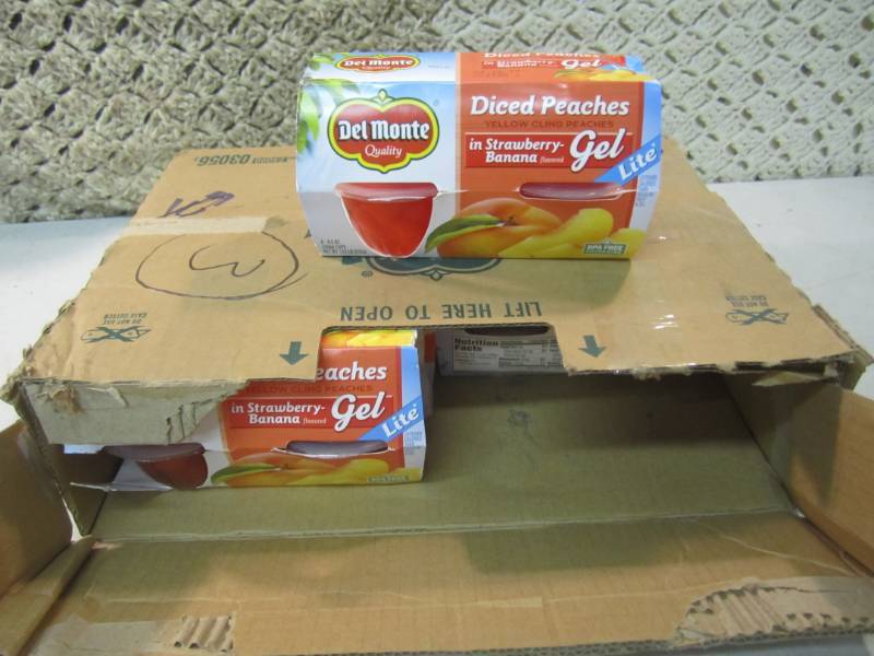 lot 96 image: Case of 6 4-Packs of Del Monte Dice...