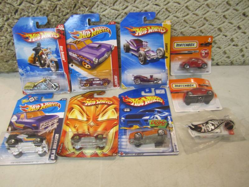 lot 115 image: Lot of 9 Hot Wheels and Matchbox Ca...