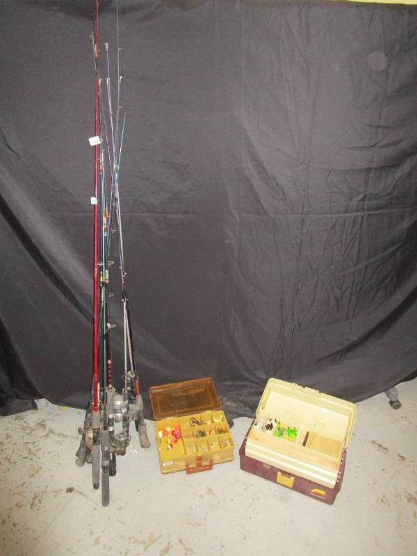 lot 13 image: 10 fishing rods with reels and tackle boxes with misc tackle in them