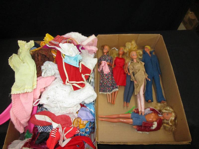 lot 87 image: Barbie Dolls and cloths